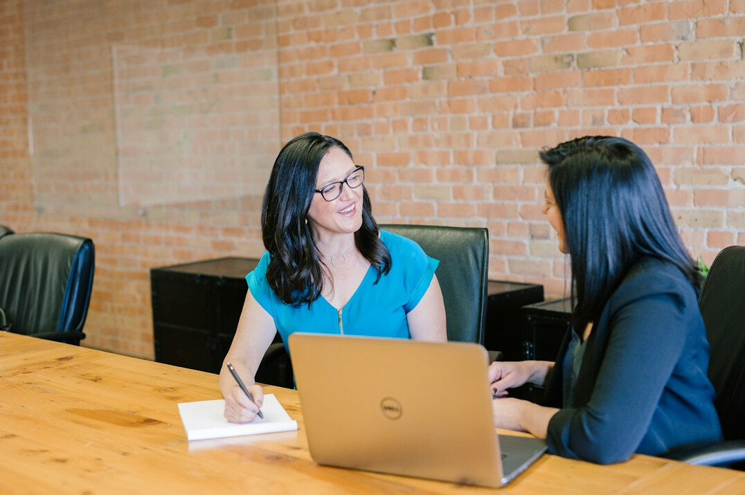mentor guiding young professional